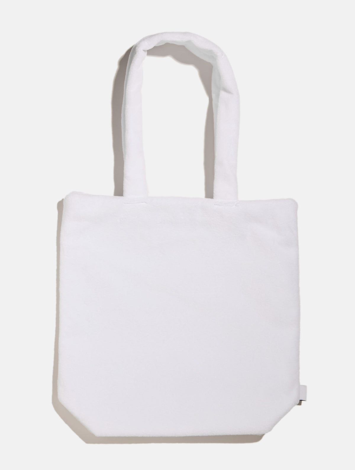 Peanuts x Skinnydip Snoopy Fluffy Tote Bag with Chrome Charm - Image 2